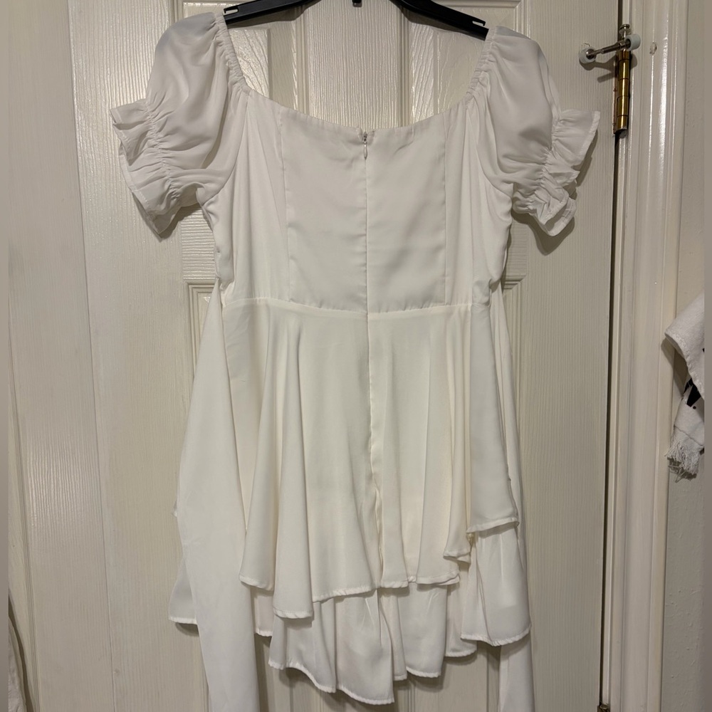 Francesca’s White Ruffle Romper - Picture 2 of 2
